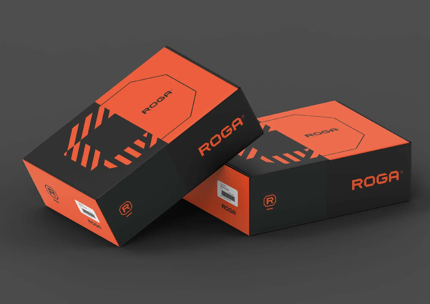 Dos cajas de kits ROGA, naranjas y negras, apiladas